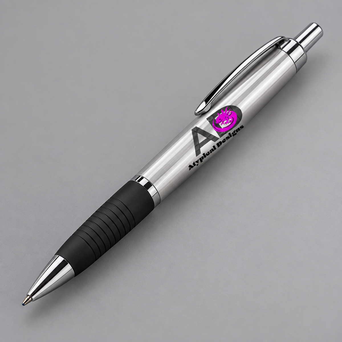 Branded pen mockup, approximately 5.75 inches long, with Atypical Designs sample artwork