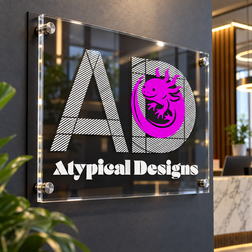 Atypical Designs logo on clear mounted acrylic sign
