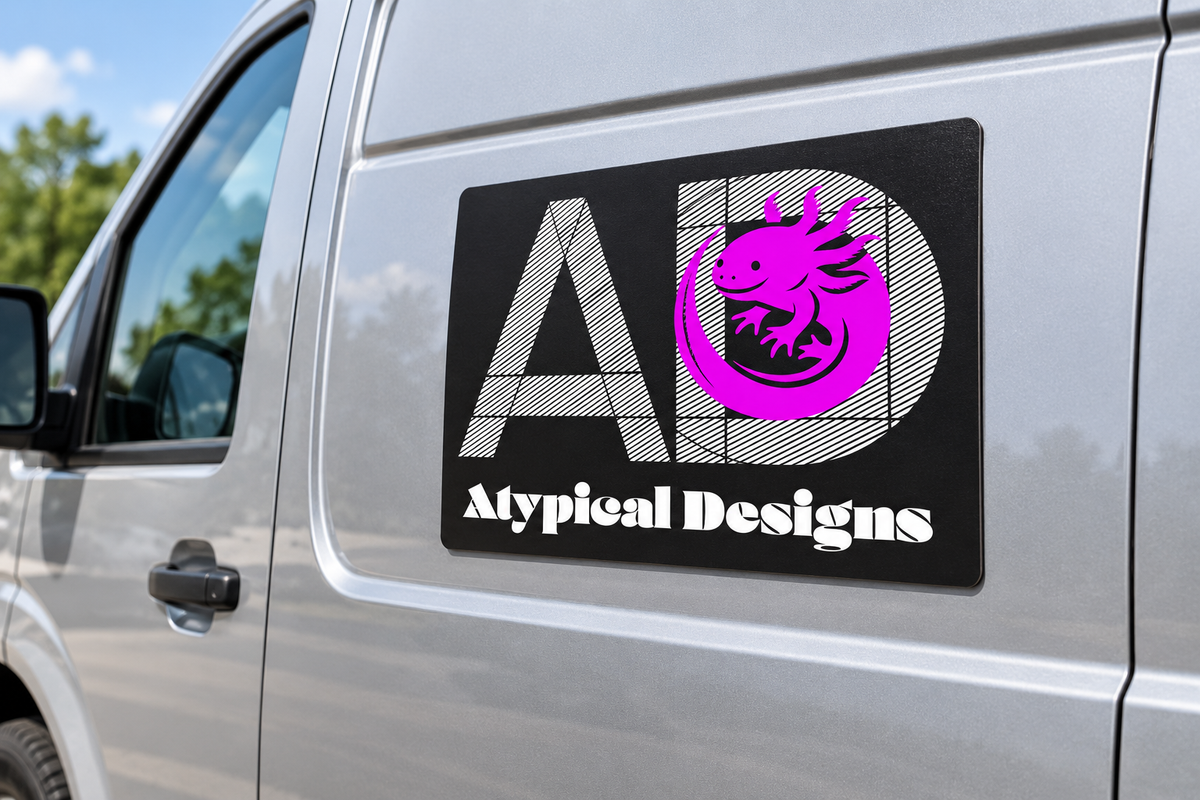Custom Printed Magnets 12 × 18 in mockup with Atypical Designs logo on vehicle panel
